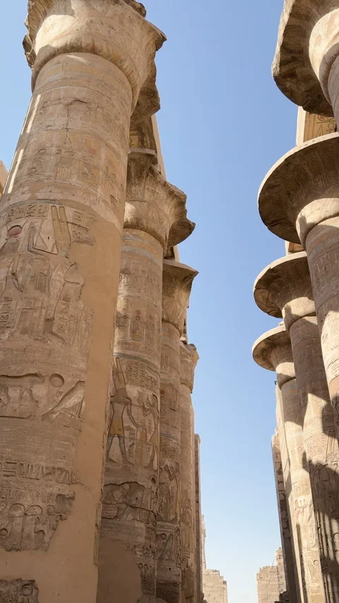 Massive stone columns with ancient Egyptian hieroglyphs Stock Footage 335464483