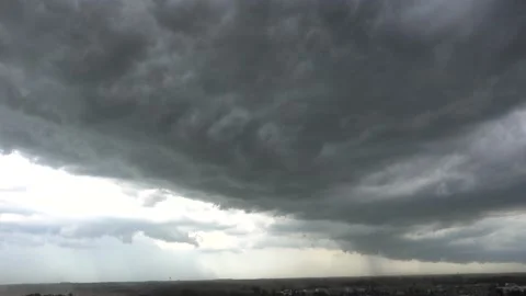 Massive Storm Clouds Over Small City Town During Day With Rainfall Coming Do Stock Footage 165630357