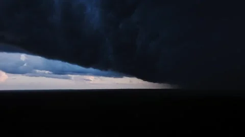 Massive Storm Front Devours Horizon As Darkness Overtakes Fading Evening Light Stock Footage 320888116