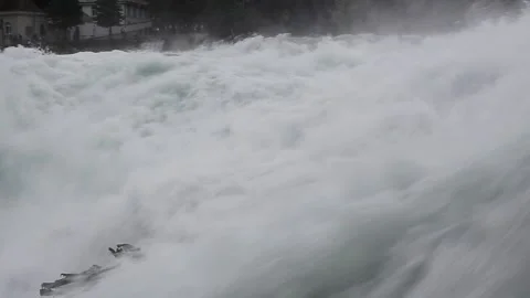 Massive streams of water at a waterfall in Schaffhausen on the river Rhine. Stock Footage 146816053