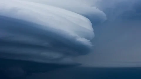 Massive supercell thunderstorm forming over the ocean Stock-Footage 333150761