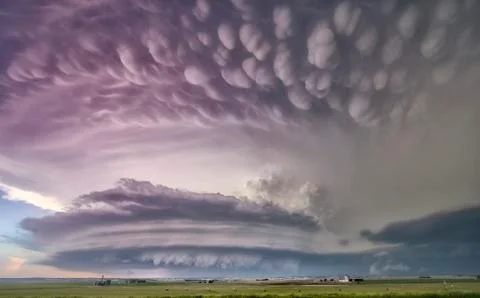 A massive tornado super-cell with mammatus, arcus, tail cloud, and wall cloud, Stock Photos