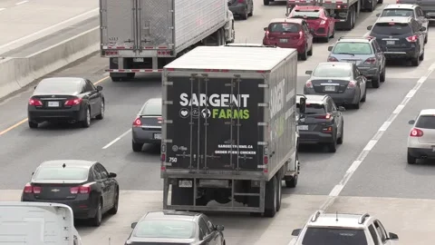 Massive Toronto highway traffic jam with cars and trucks on the busy 401 動画素材 151059495