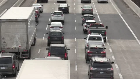 Massive Toronto highway traffic jam with cars and trucks on the busy 401 Video stock 151060206