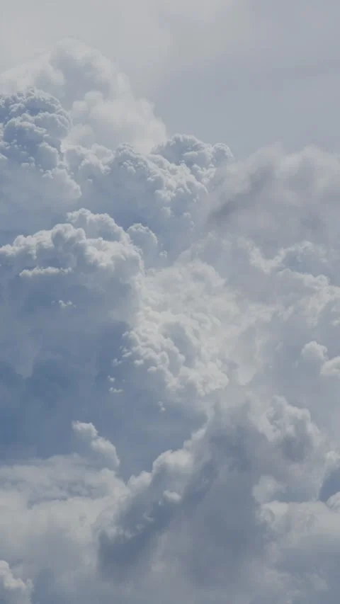 Massive towering cumulonimbus storm cloud formation Stock Footage 336435285