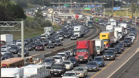 Massive traffic jam and gridlock on highway in Toronto Stock Footage 94098127