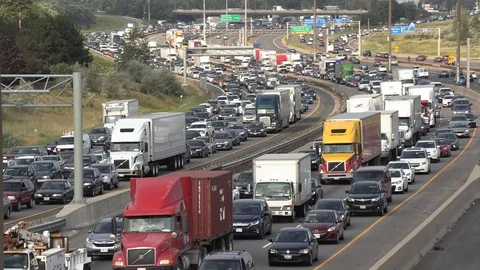 Massive traffic jam and gridlock on highway in Toronto Stock Footage 94098218