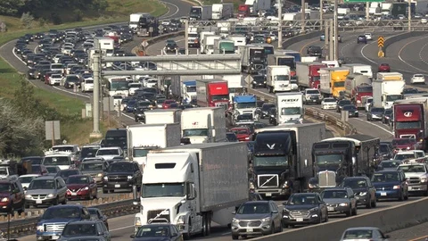Massive traffic jam and gridlock on highway in Toronto Stock Footage 94099005