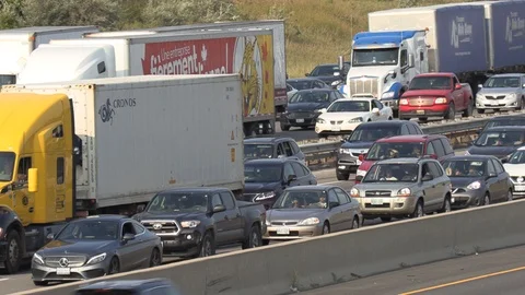 Massive traffic jam and gridlock on highway in Toronto Stock Footage 94099231
