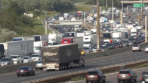 Massive traffic jam and gridlock on highway in Toronto Stock Footage 94099352