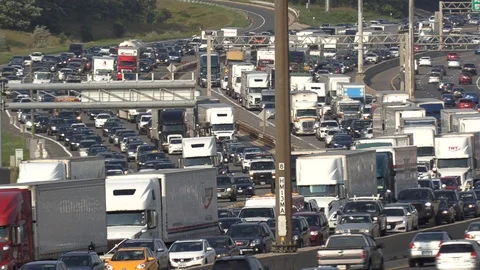Massive traffic jam and gridlock on highway in Toronto Stock Footage 94099423
