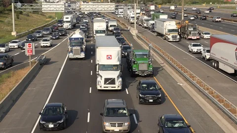 Massive traffic jam and gridlock on highway in Toronto Stock Footage 94100030