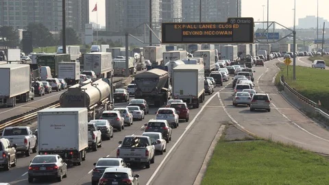 Massive traffic jam and gridlock on highway in Toronto Stock Footage 94100582