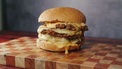 Massive Triple Deck Smash Cheese Burger Stock Footage 325223983