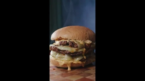 Massive Triple Deck Smash Cheese Burger Stock Footage 325223986