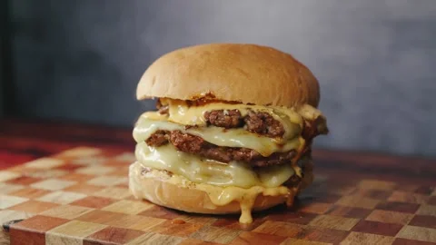 Massive Triple Deck Smash Cheese Burger Stock Footage 325223987