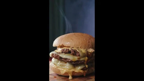 Massive Triple Deck Smash Cheese Burger Stock Footage 325223994