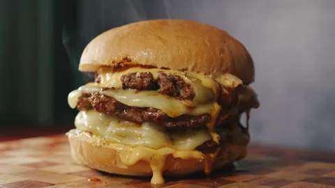 Massive Triple Deck Smash Cheese Burger Stock Footage 325224003