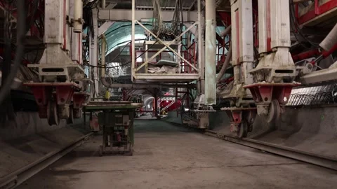 Massive tunnel boring system with rails hydraulic arms and suspended platforms s Stock Footage 309657284