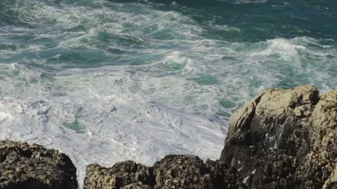 Massive water splash from large wave hitting coast Stock Footage 168774784