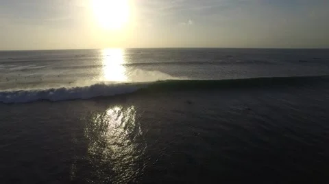 A massive wave breaking in the sunset (Bali, Indonesia) Stock Footage 61947518