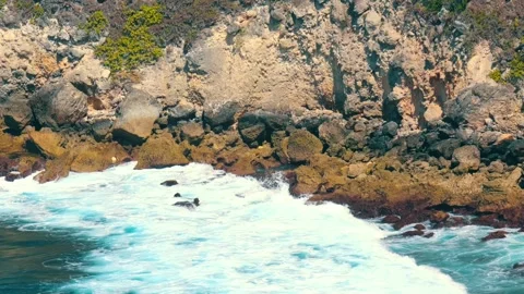 Massive Wave Explosion on Limestone Cliff Wall Stock Footage 281999295