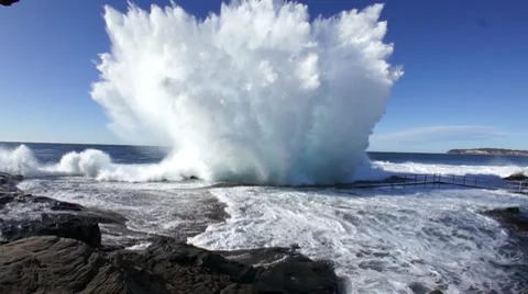 Massive wave splash at rock pool Stock Footage 9424155