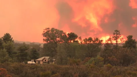 Massive wildfire spreading through bush towards property; Fairview Fire Stock-Footage 218360619
