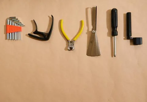 Master Adjusting and Changing Guitar Strings: Tools for Guitar Maintenance .. Stock Photos