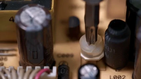 Master adjusts the screwdriver voltage, macro shot Stock Footage 73437401