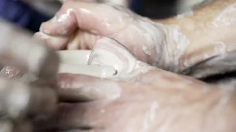 Master and apprentice learning clay crafting Stock Footage 150681000