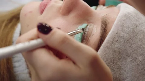 The master applies applies composition for lamination of eyelashes. Stock Footage 195320761