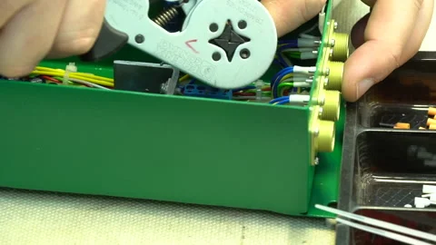 The master assembles the junction box Stock Footage 157758647