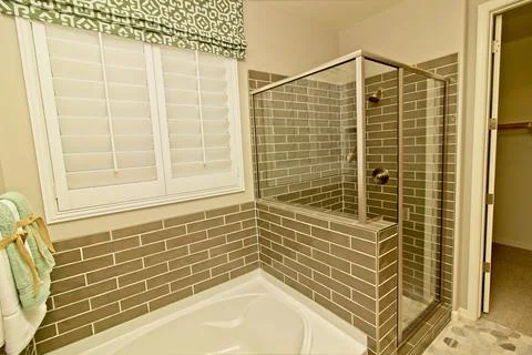 Master Bathroom With Corner Shower Stock Photos