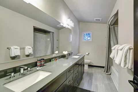 Master bathroom interior with double sink vanity cabinet. Northwest, USA Stock Photos