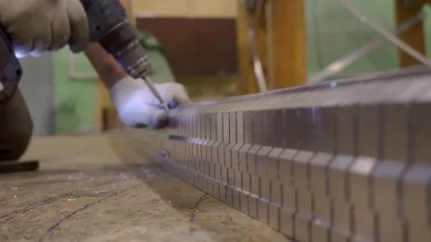 Master bends aluminum profile for stretch ceilings. Frame. Stock Footage 143274582