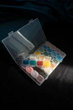 Master box for storing containers with beads Stock Photos