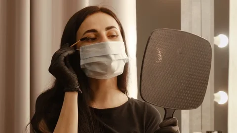 Master brushes her eyelashes Stock-Footage 107327424