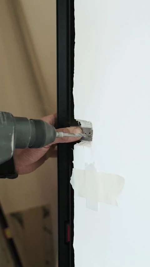 Master builder makes installation of doors and repairs inside house Stock Footage 302986267