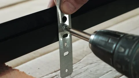 Master builder makes installation of doors and repairs inside house Stock Footage 302987490