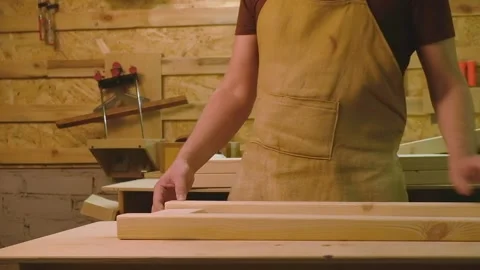 The master carefully checks the work with the board on the milling machine Video stock 182225065