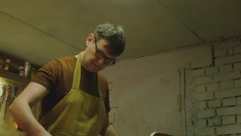 The master carefully checks the work Stock Footage 182228126