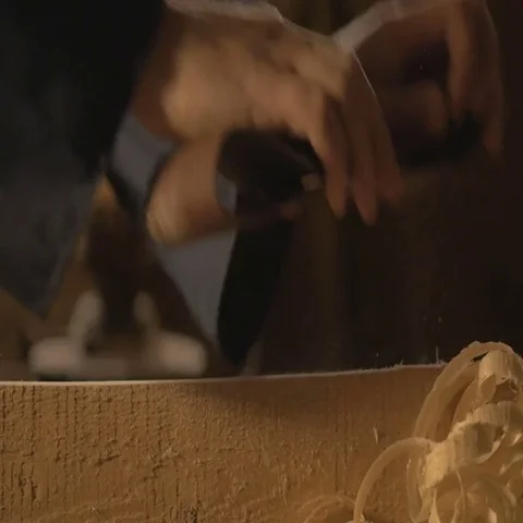 Master carpenter makes basting on the Board with a pencil, draws, craftsman work Stock Footage 69524323