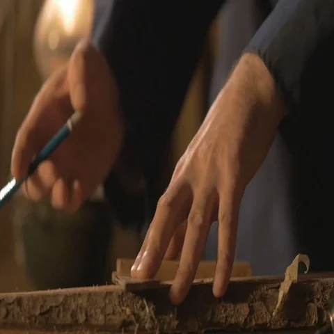 Master carpenter makes basting on the Board with a pencil, draws, craftsman work Stock Footage 69526002