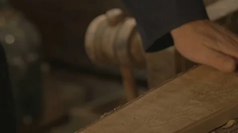 Master carpenter makes basting on the Board with a pencil, draws, craftsman work Stock Footage 69728548