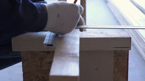 Master carpenter mounts pine wood floor - eco-friendly flooring. Stock Footage 107169487