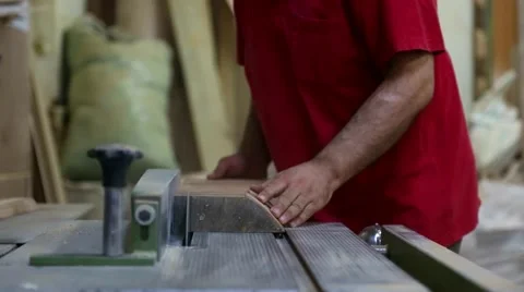 Master carpenter works at workshop Stock Footage 64990633