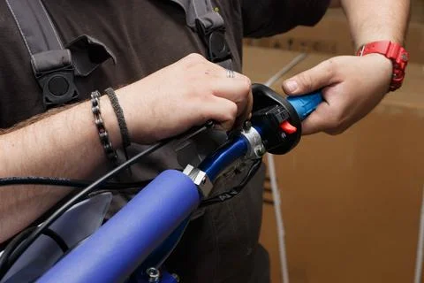 The master carries out the process of installing or replacing the throttle .. Stock Photos