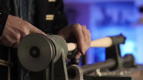 The master carves the product from wood Stock Footage 258908486