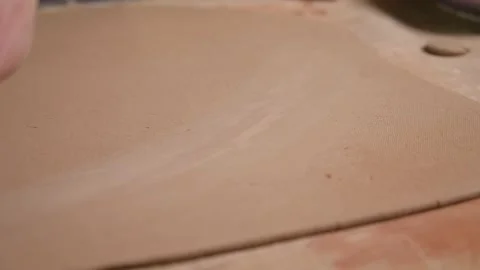 Master ceramist works in pottery studio. Process of creating plate 库存影片 170603645